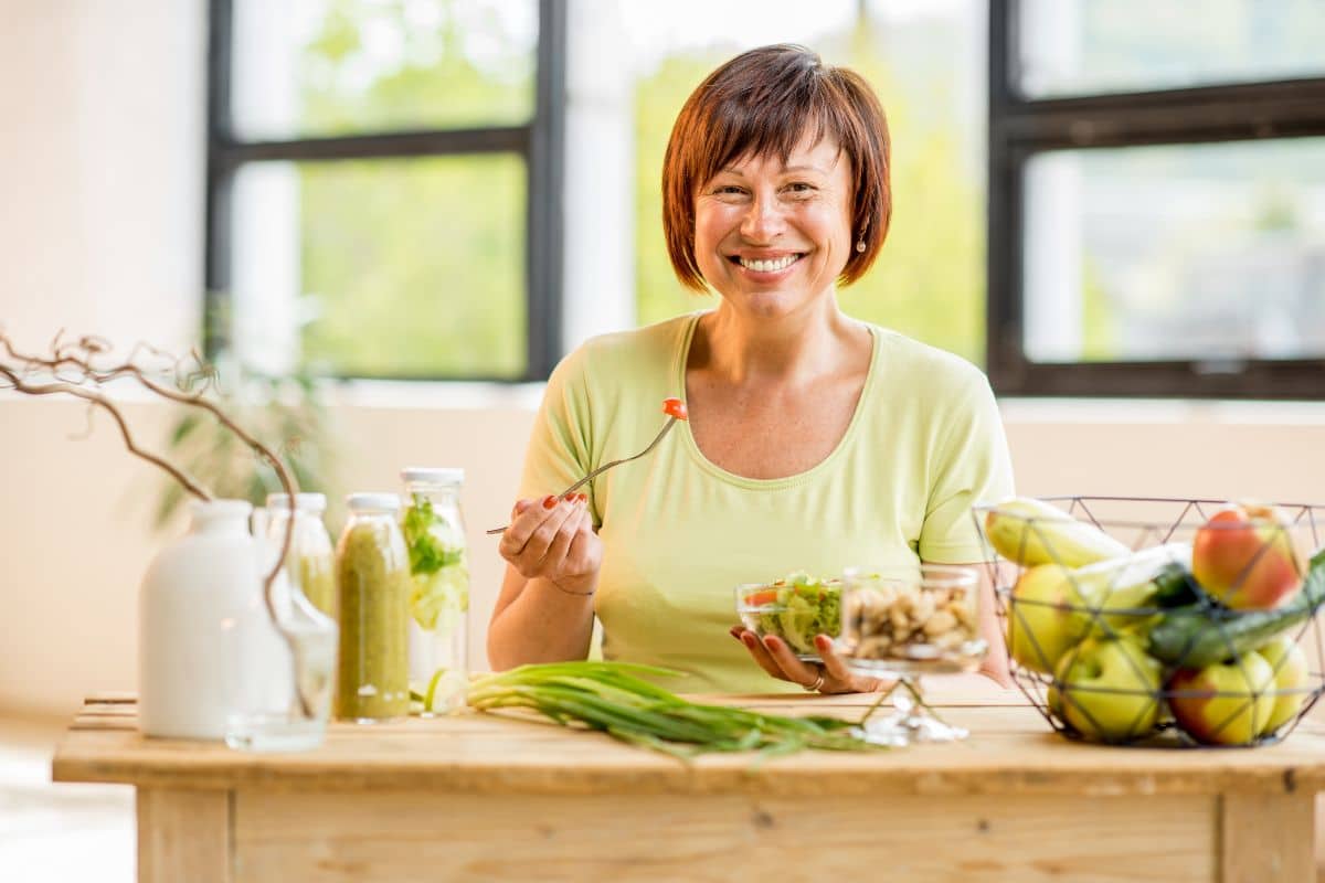 weight loss over 45 - middle aged woman eating salad